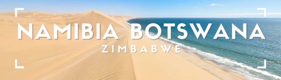 Dune di sabbia che si estendono verso un mare blu con cielo azzurro.