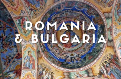 Monastero di Rila in Bulgaria con affreschi esterni e montagne circostanti nei Monti Rila