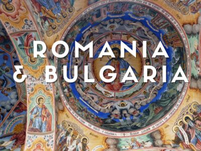 Monastero di Rila in Bulgaria con affreschi esterni e montagne circostanti nei Monti Rila