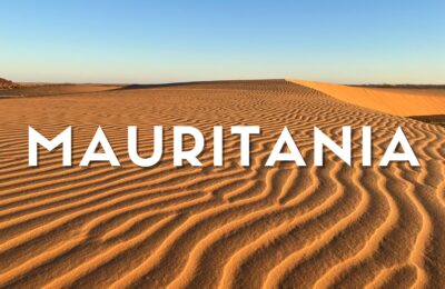 Dune di sabbia dorata nel deserto dell'Amatlich in Mauritania durante il tramonto